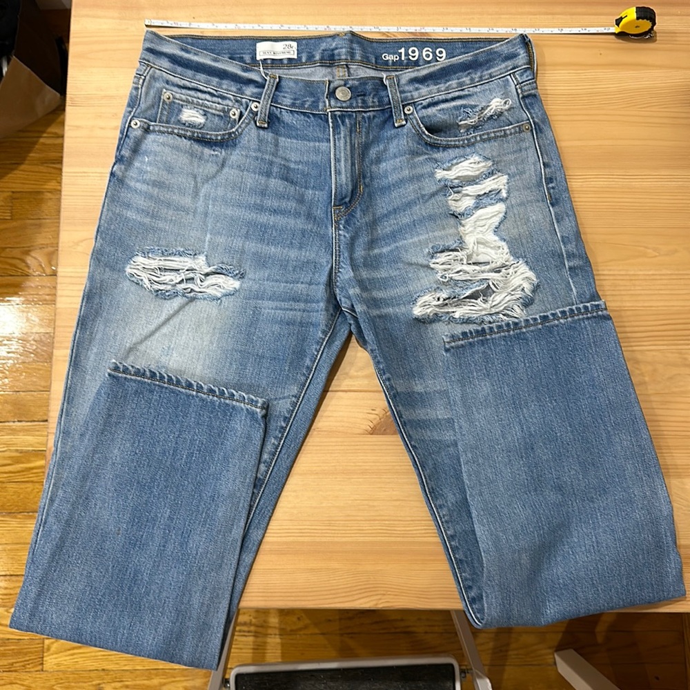 28R Gap sexy bf jean. Lots of rips, great denim (best suited for a size 6)